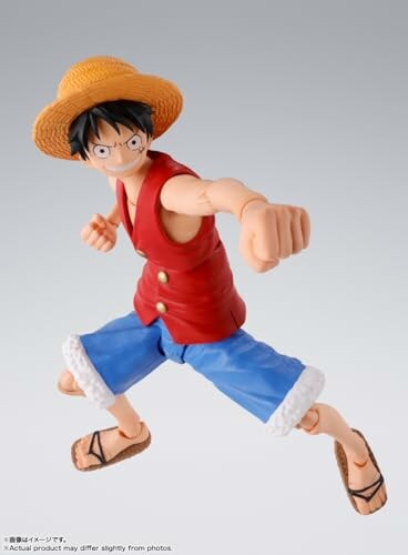 Anime action figure in red vest and blue shorts.