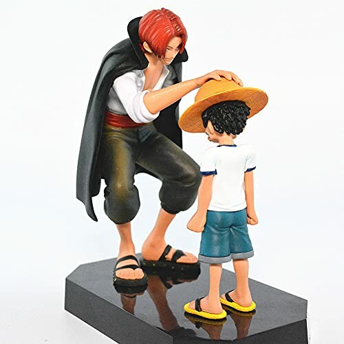 Figure of a red-haired man with a cape placing a straw hat on a child.