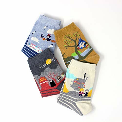 Four pairs of colorful socks with animated designs.