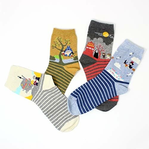 Four pairs of colorful socks with cartoon designs on a white background.