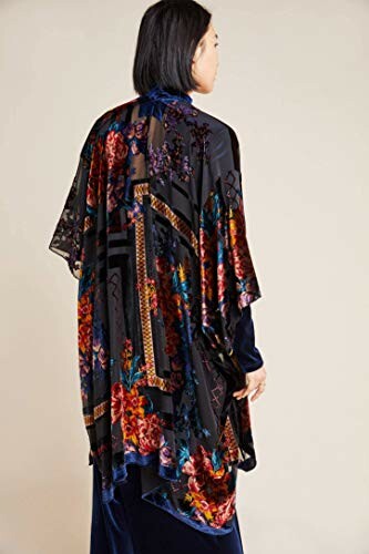 Person wearing a colorful floral kimono jacket