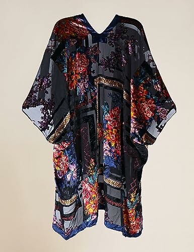 A colorful floral printed kaftan on a neutral background.