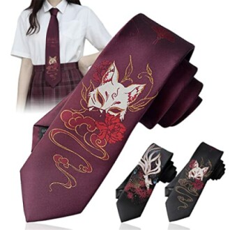 Purple tie with Japanese fox mask design, worn by person in uniform.