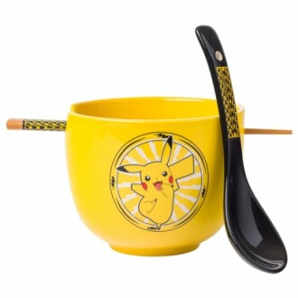 Yellow ramen bowl with Pikachu design, spoon, and chopsticks.