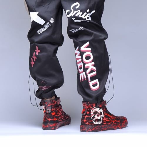 Streetwear pants with text and red-black boots