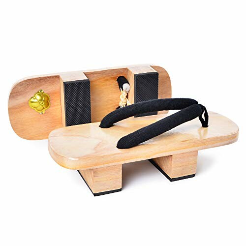 Traditional wooden geta sandals with black straps.